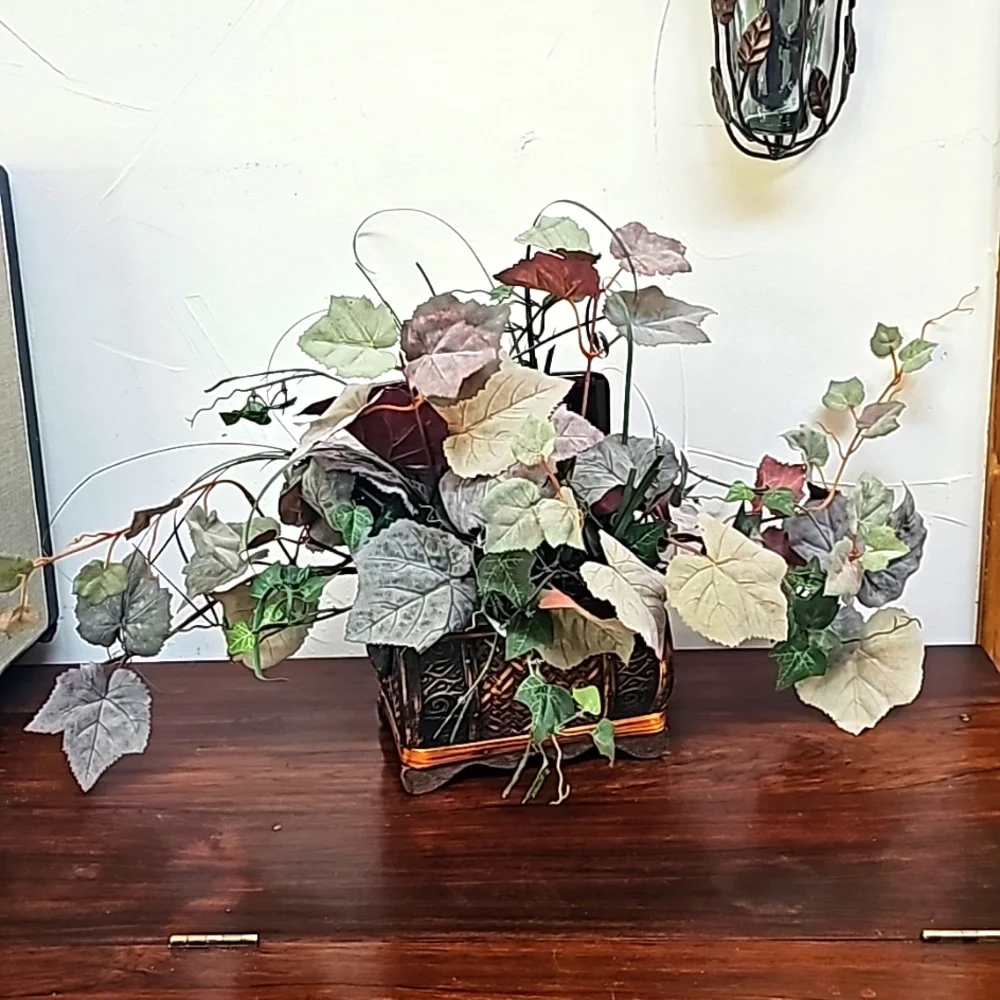 Vintage faux plant in wooden chest box decoration